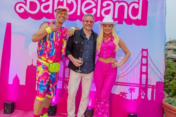 Barbie and Ken with party guest