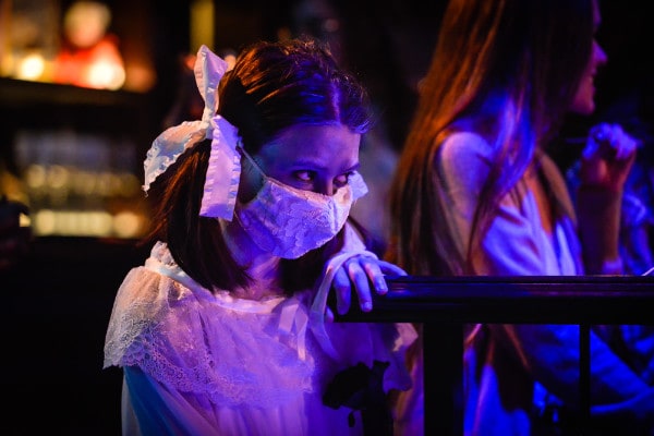 Haunted girl with mask