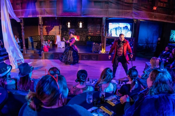 Haunted show actors performing on stage